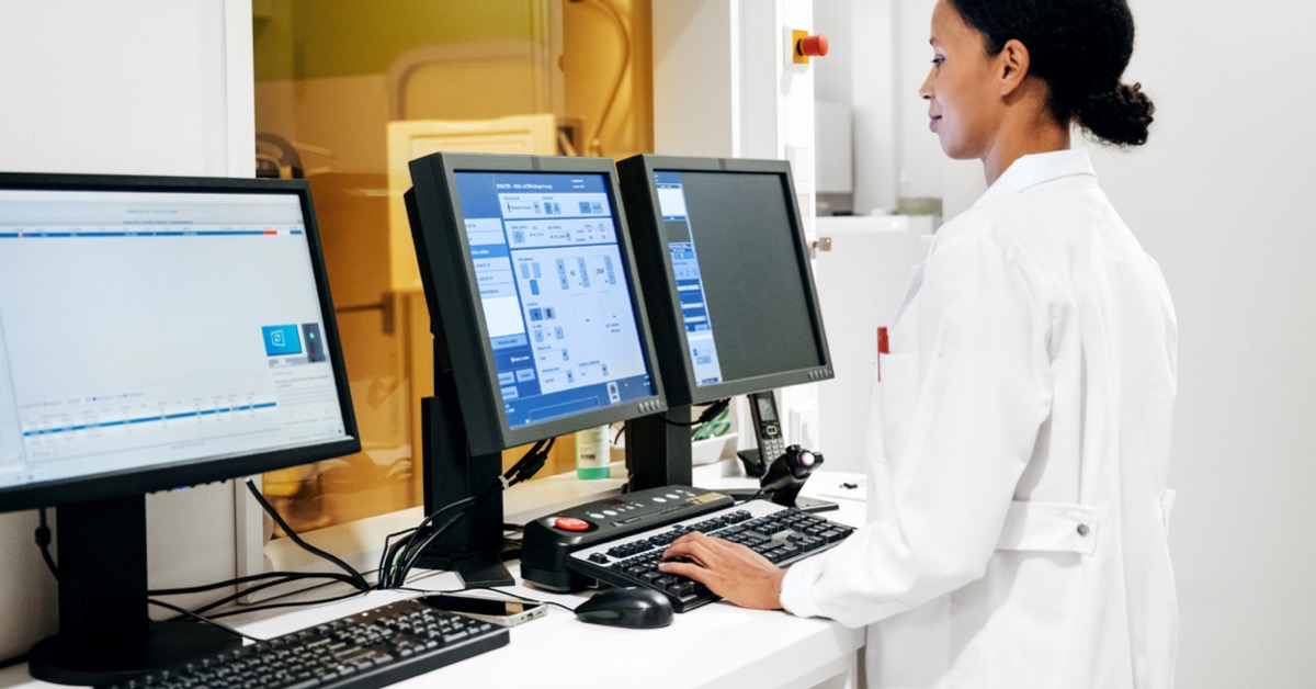 Image of a person in front of a computer