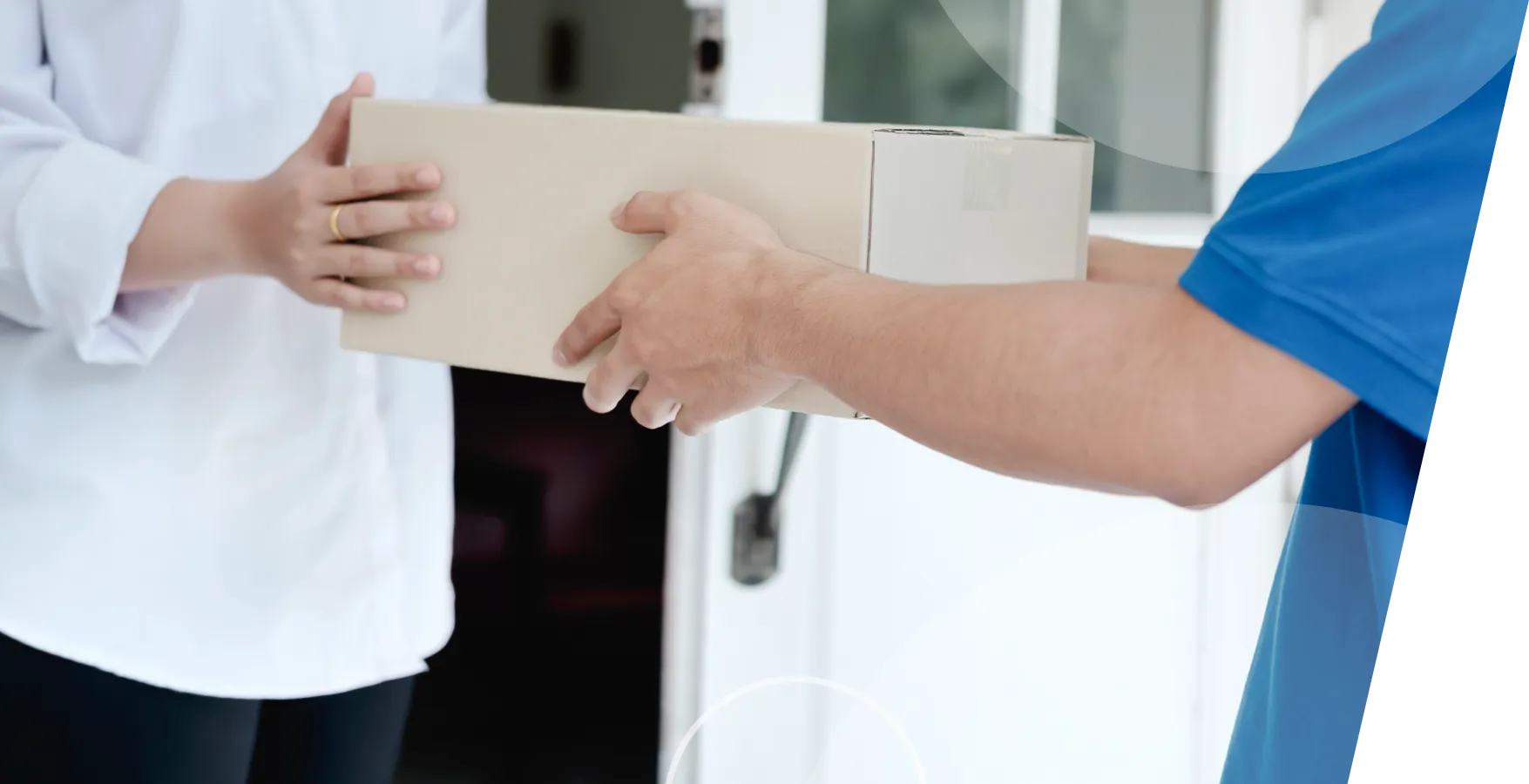 Delivery person handing a medical delivery box to another person.